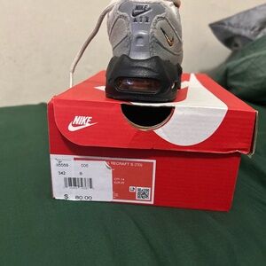 Nike Air Sneakers in Gray and Black with Orange Detail